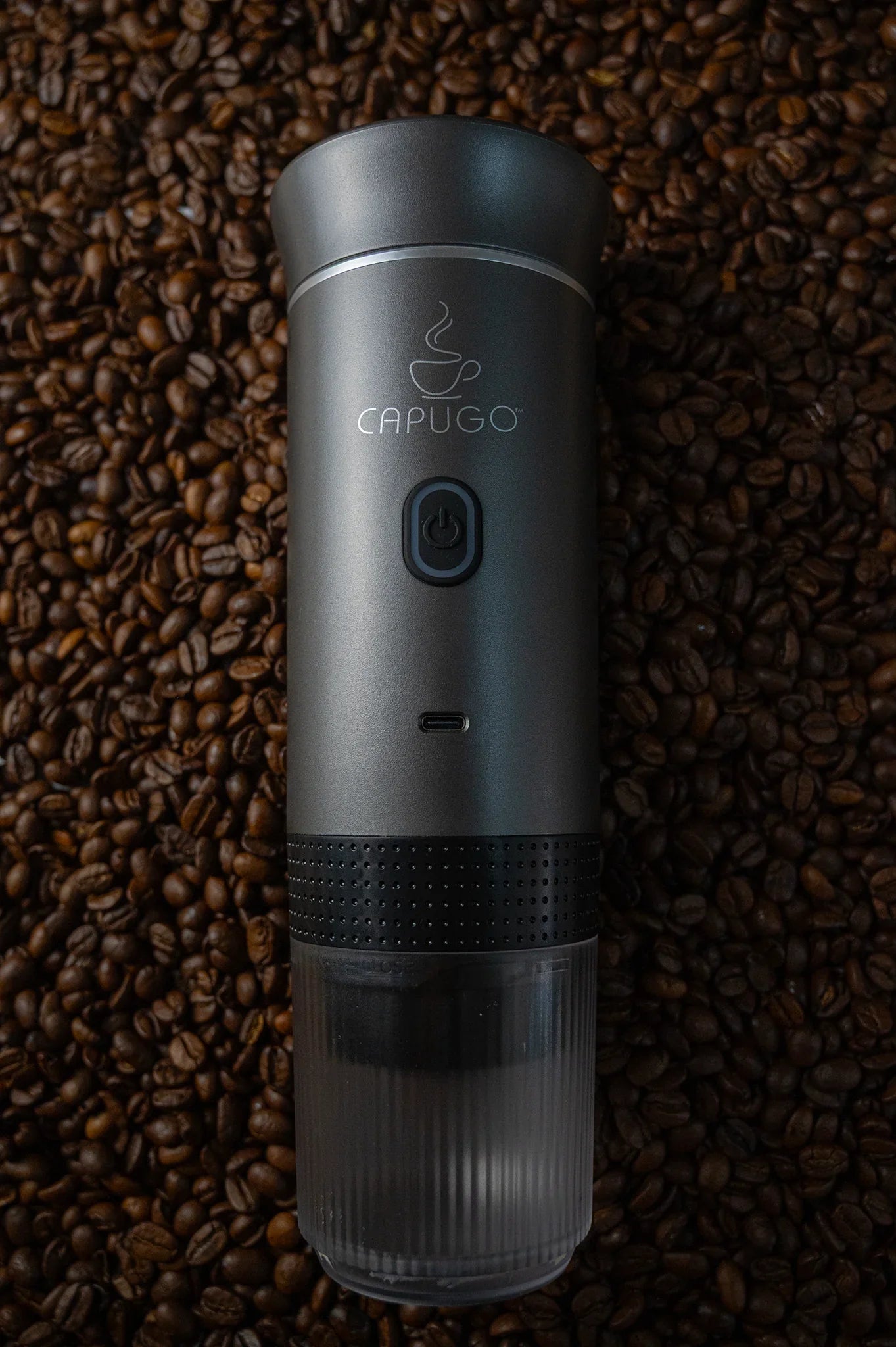 Portable Coffee Machine Capugo placed in Coffee Beans